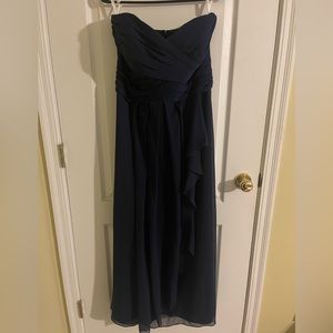 Navy strapless bridesmaid dress.